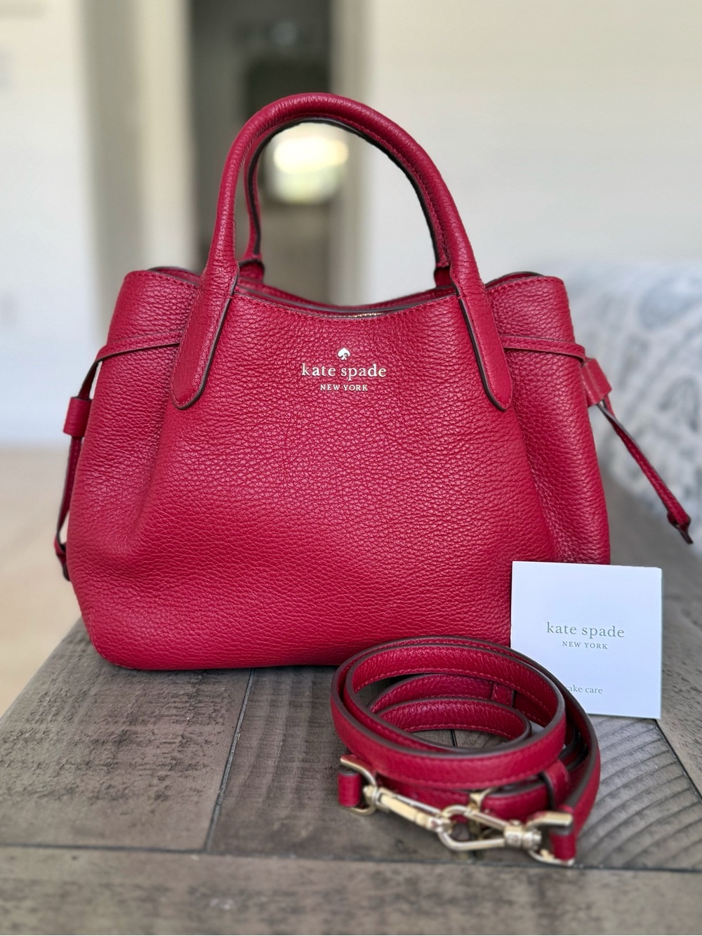 Kate Spade Red Leather Dumpling Satchel with Structured Design